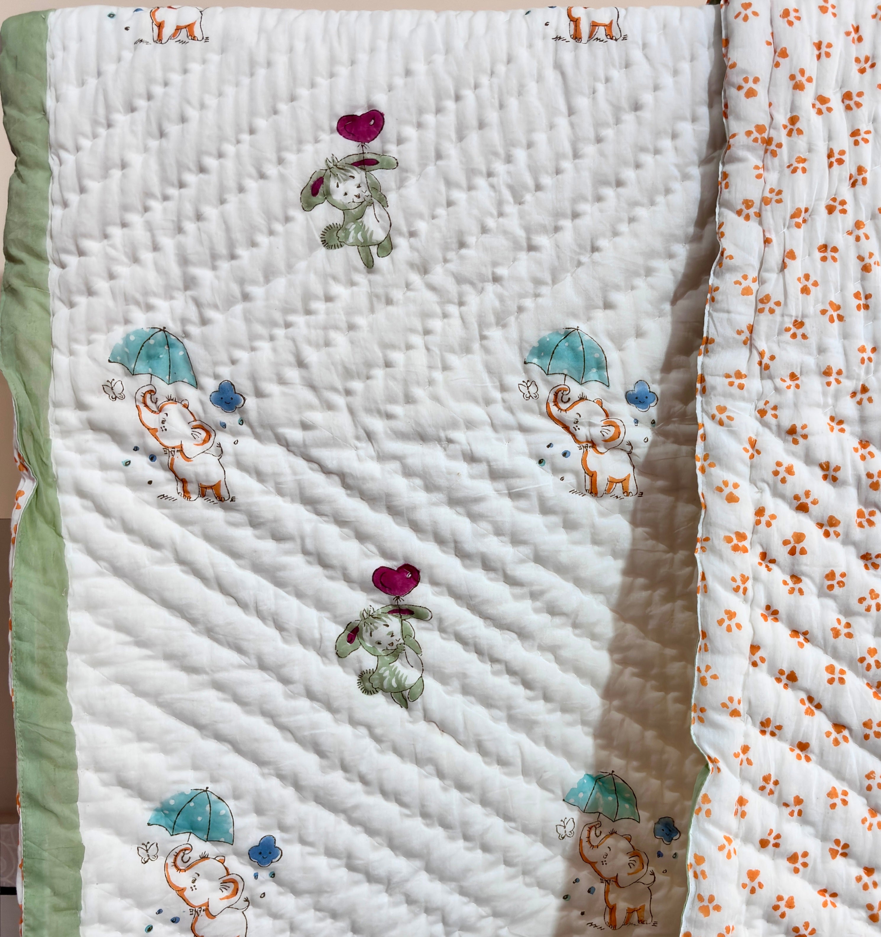 Handblock printed baby quilt