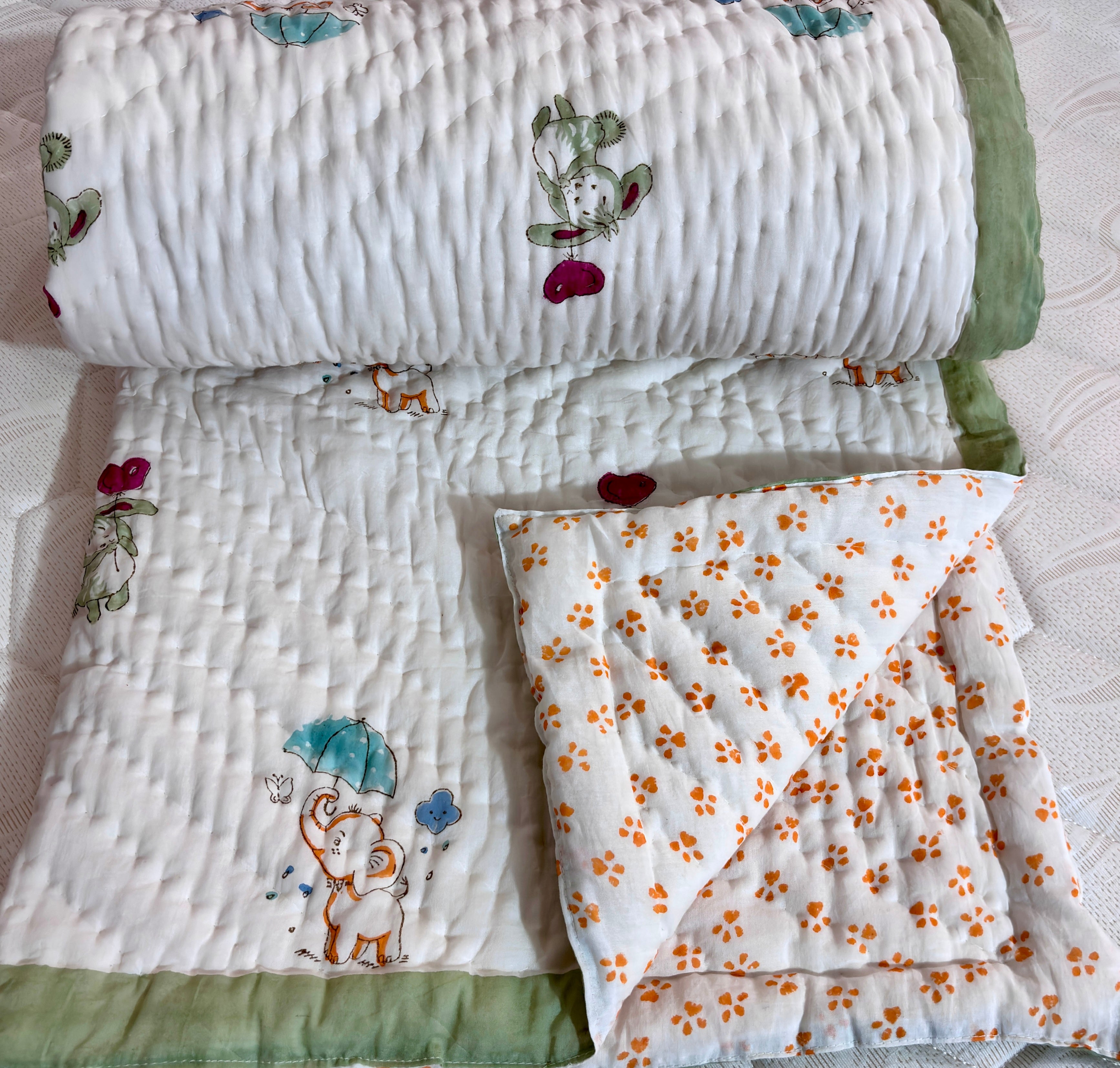 Handblock printed baby quilt